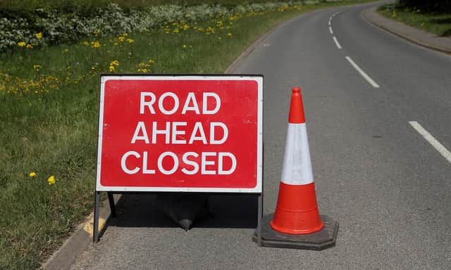 Road Ahead Closed sign